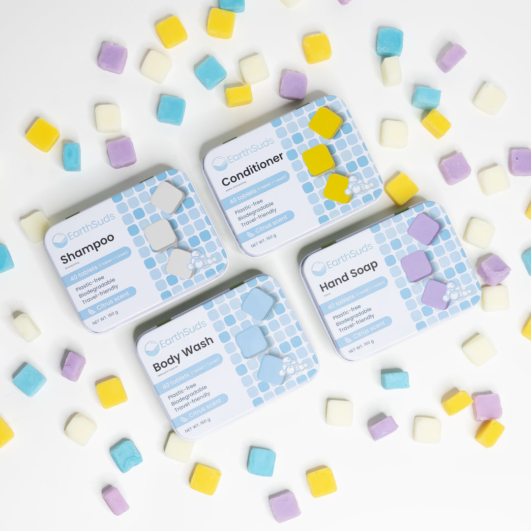 Refillable, plastic-free, travel-friendly tins of biodegradable shampoo, conditioner, hand soap, and body wash tablets 