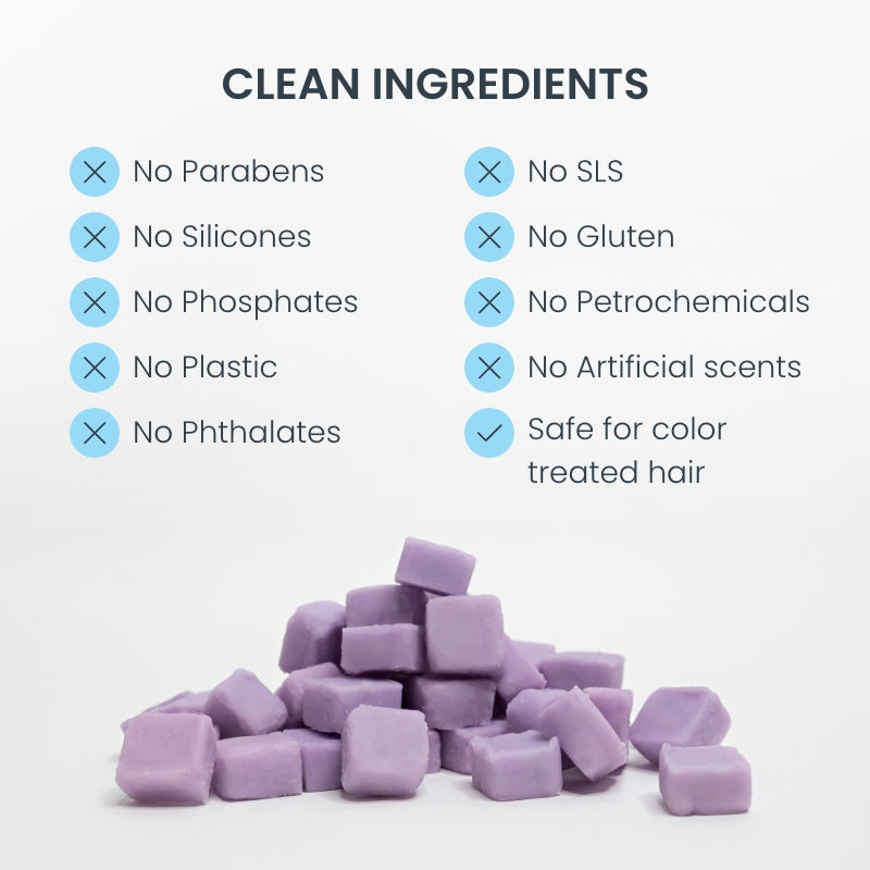 Pile of eco-friendly hand soap tablets with list of clean ingredients that are paraben-free, phosphate-free, silicone-free
