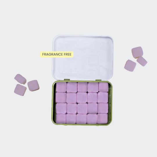 Travel hand soap with purple tablets in a reusable case that's plastic-free and sustainable.